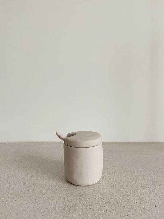 Stoneware cellar & spoon