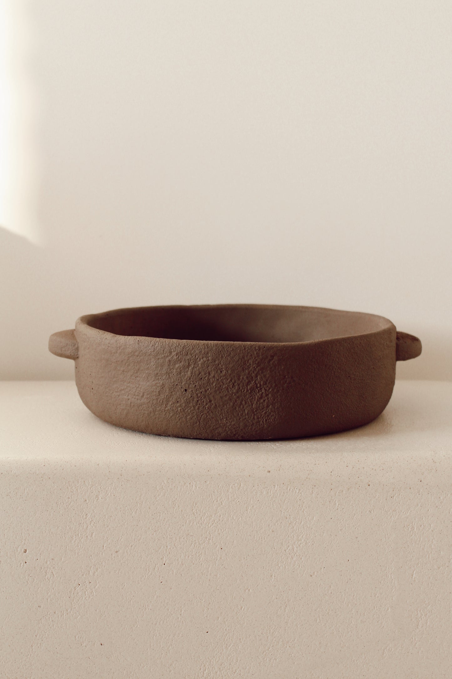 Brown cement bowl